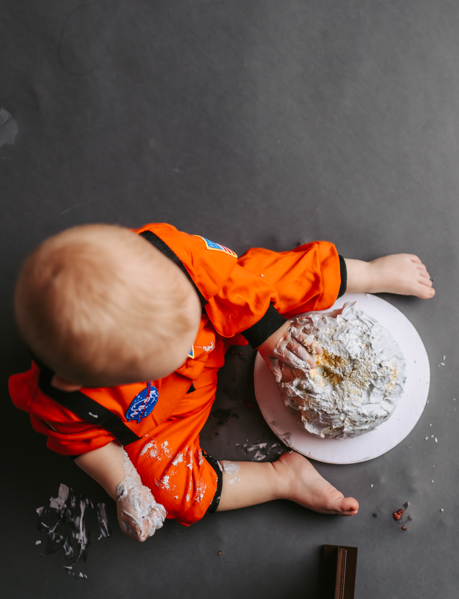 Colorado Family Photographer, Cake Smash, Spaced themed Cake Smash, Studio Cake Smash, Colorado Milestone session, in home sessions, Fruit bath, milestone photos, Colorado Cake Smash, Milestone Photography, Portrait Photography, Cake Smash Ideas, Cake Smashv Guide, Cake Smash Inspiration, How to do a One year Milestone, How to do a one year cake smash, How to do a Cake Smash, Baby one year portraits, Kids Portraits, Milestone photo ideas, Bubble Bath idea, Colorado Lifestyle photographer, Lifestyle photography, Space cake Smash, Astronaut, nasa, Space,