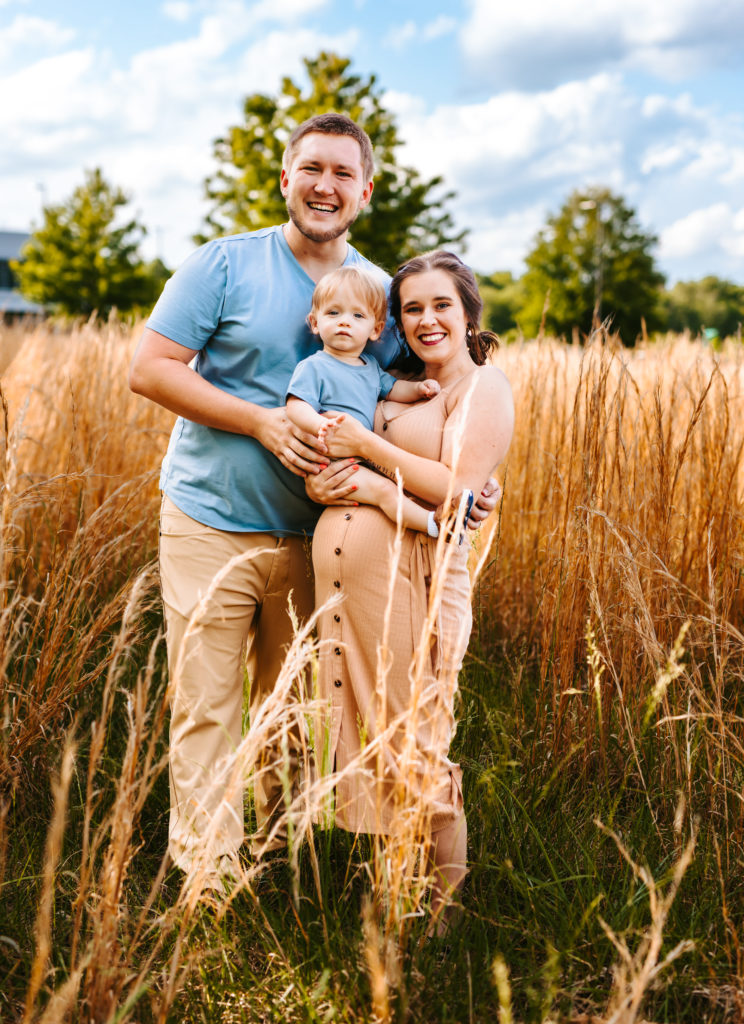 North Carolina Maternity Photographer, Stormy North Carolina Session, Maternity Photos, Maternity Photo ideas, Summer Maternity Photos, Maternity Photographer, Lifestyle Photographer, Family Maternity Photographer, North Carolina Photographer, Tall grass, Family of 3 Maternity Photos, North Carolina,