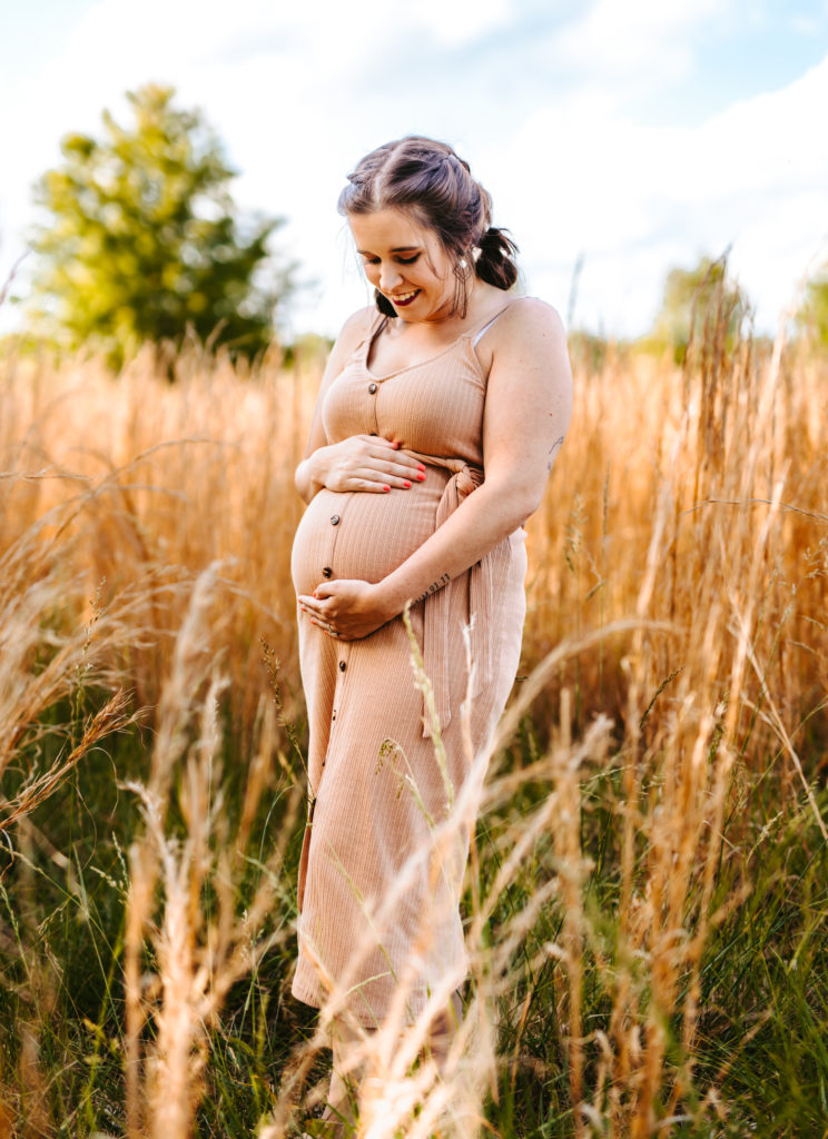 North Carolina Maternity Photographer, Stormy North Carolina Session, Maternity Photos, Maternity Photo ideas, Summer Maternity Photos, Maternity Photographer, Lifestyle Photographer, Family Maternity Photographer, North Carolina Photographer, Tall grass, Family of 3 Maternity Photos, North Carolina,