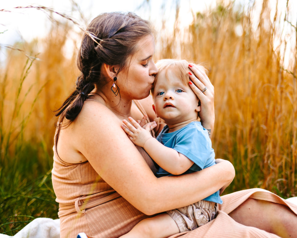 North Carolina Maternity Photographer, Stormy North Carolina Session, Maternity Photos, Maternity Photo ideas, Summer Maternity Photos, Maternity Photographer, Lifestyle Photographer, Family Maternity Photographer, North Carolina Photographer, Tall grass, Family of 3 Maternity Photos, North Carolina,