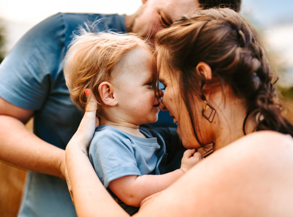 North Carolina Maternity Photographer, Stormy North Carolina Session, Maternity Photos, Maternity Photo ideas, Summer Maternity Photos, Maternity Photographer, Lifestyle Photographer, Family Maternity Photographer, North Carolina Photographer, Tall grass, Family of 3 Maternity Photos, North Carolina,