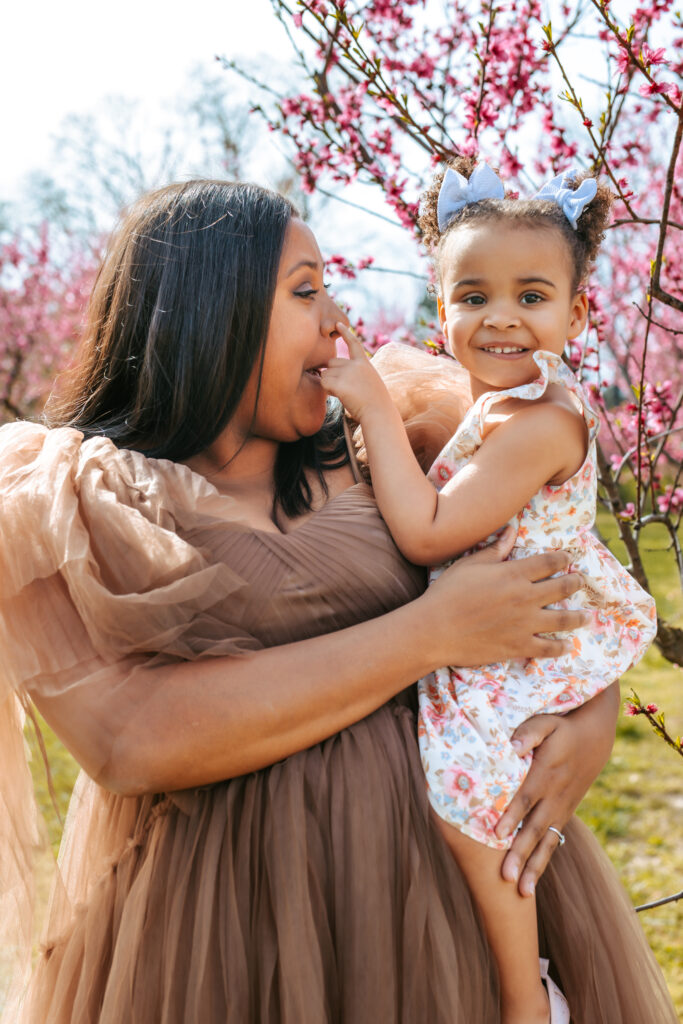 Soon to be Mother of two Maternity portrait amid the Peach blooms at Millstone Creek Orchard - By RattTrap Artistry 