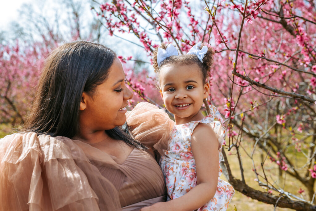 Soon to be Mother of two Maternity portrait amid the Peach blooms at Millstone Creek Orchard - By RattTrap Artistry 