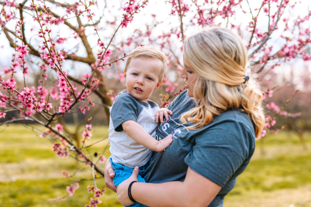 Motherhood Mini's, North Carolina Photographer, Motherhood Sessions, Springs Mini's, Peach Bloom Mini's, Millstone Creek Orchard, North Carolina Family Photographer, Motherhood, Spring Photo ideas, Motherhood sessions, mothers day photos, mothers day photo ideas, spring time, Motherhood Inspiration, Mommy & me Photo ideas, Motherhood photo ideas, Peach Blossoms, 