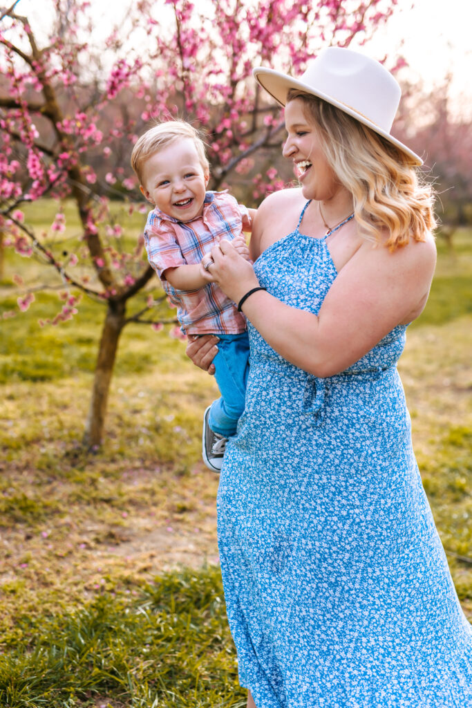 Motherhood Mini's, North Carolina Photographer, Motherhood Sessions, Springs Mini's, Peach Bloom Mini's, Millstone Creek Orchard, North Carolina Family Photographer, Motherhood, Spring Photo ideas, Motherhood sessions, mothers day photos, mothers day photo ideas, spring time, Motherhood Inspiration, Mommy & me Photo ideas, Motherhood photo ideas, Peach Blossoms, 