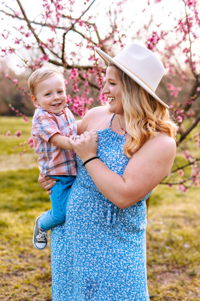 Motherhood Mini's, North Carolina Photographer, Motherhood Sessions, Springs Mini's, Peach Bloom Mini's, Millstone Creek Orchard, North Carolina Family Photographer, Motherhood, Spring Photo ideas, Motherhood sessions, mothers day photos, mothers day photo ideas, spring time, Motherhood Inspiration, Mommy & me Photo ideas, Motherhood photo ideas, Peach Blossoms, 