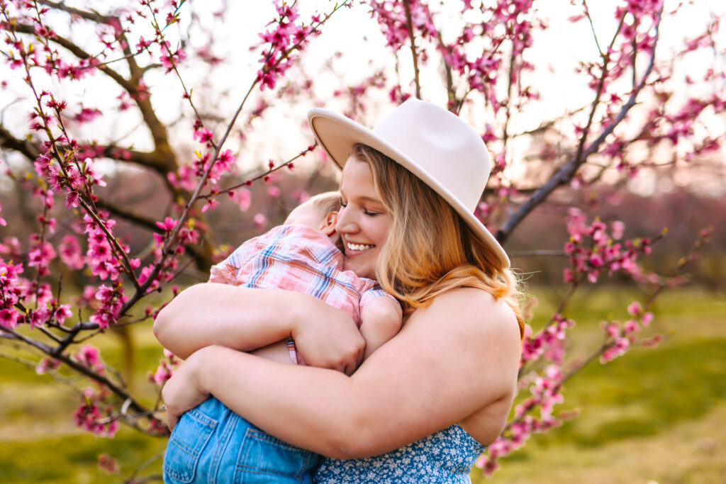 Motherhood Mini's, North Carolina Photographer, Motherhood Sessions, Springs Mini's, Peach Bloom Mini's, Millstone Creek Orchard, North Carolina Family Photographer, Motherhood, Spring Photo ideas, Motherhood sessions, mothers day photos, mothers day photo ideas, spring time, Motherhood Inspiration, Mommy & me Photo ideas, Motherhood photo ideas, Peach Blossoms, 