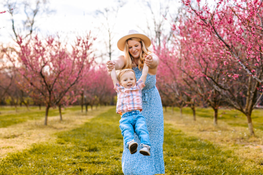 Motherhood Mini's, North Carolina Photographer, Motherhood Sessions, Springs Mini's, Peach Bloom Mini's, Millstone Creek Orchard, North Carolina Family Photographer, Motherhood, Spring Photo ideas, Motherhood sessions, mothers day photos, mothers day photo ideas, spring time, Motherhood Inspiration, Mommy & me Photo ideas, Motherhood photo ideas, Peach Blossoms, 