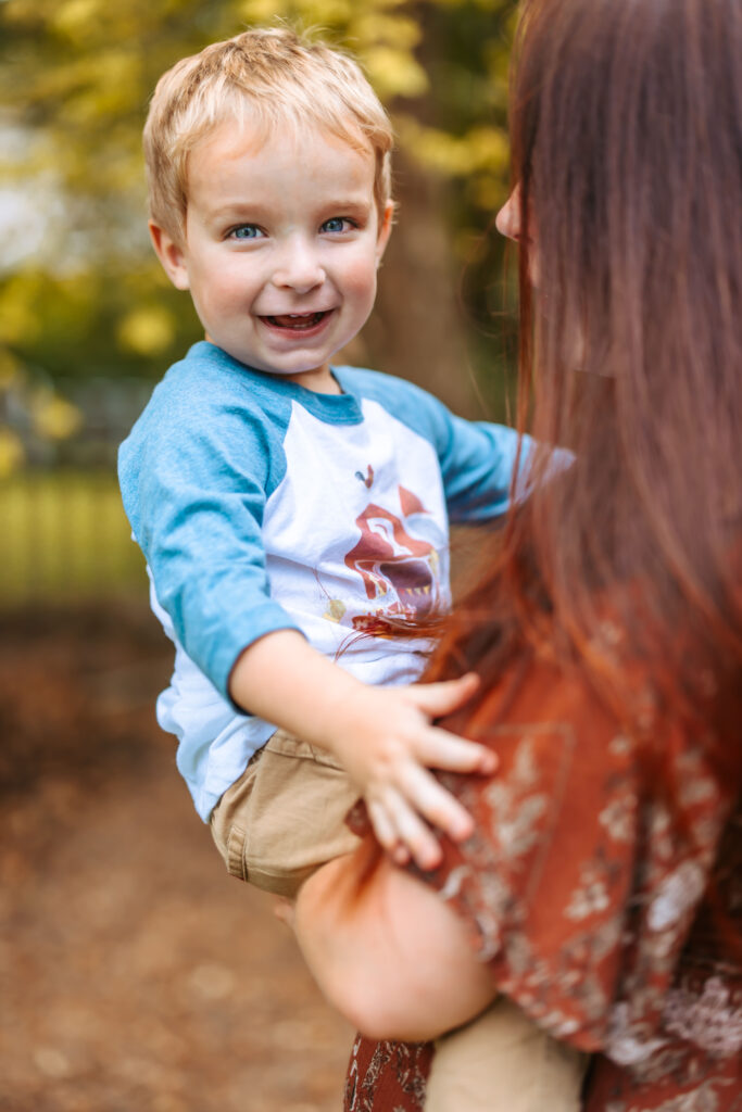 Mama holding her son, at home family photos session in High Points, North Carolina 