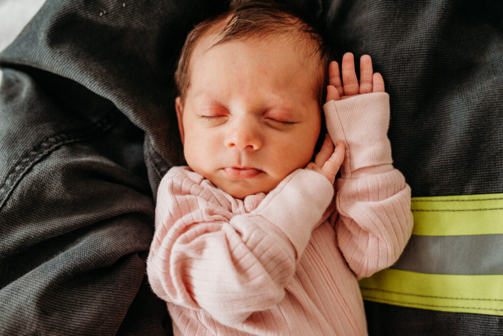 Up close shot of baby girl sleeping at in home newborn session 