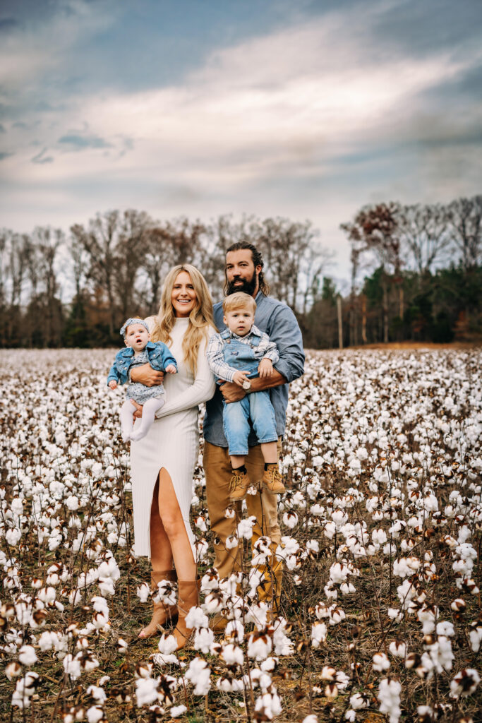 Photo of a family in a Cotton Field in Albemarle North Carolina by RattTrap Artistry North Carolina Family Photographer 