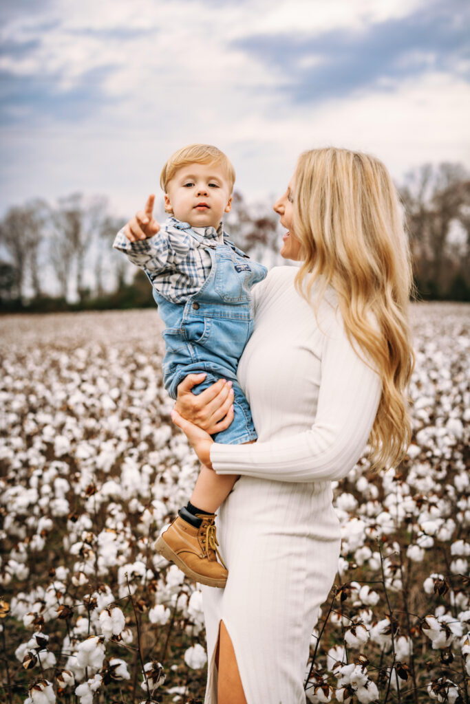 mother and son in a cotton field in North Carolina Captured by Family Photographer RattTrap Artistry 