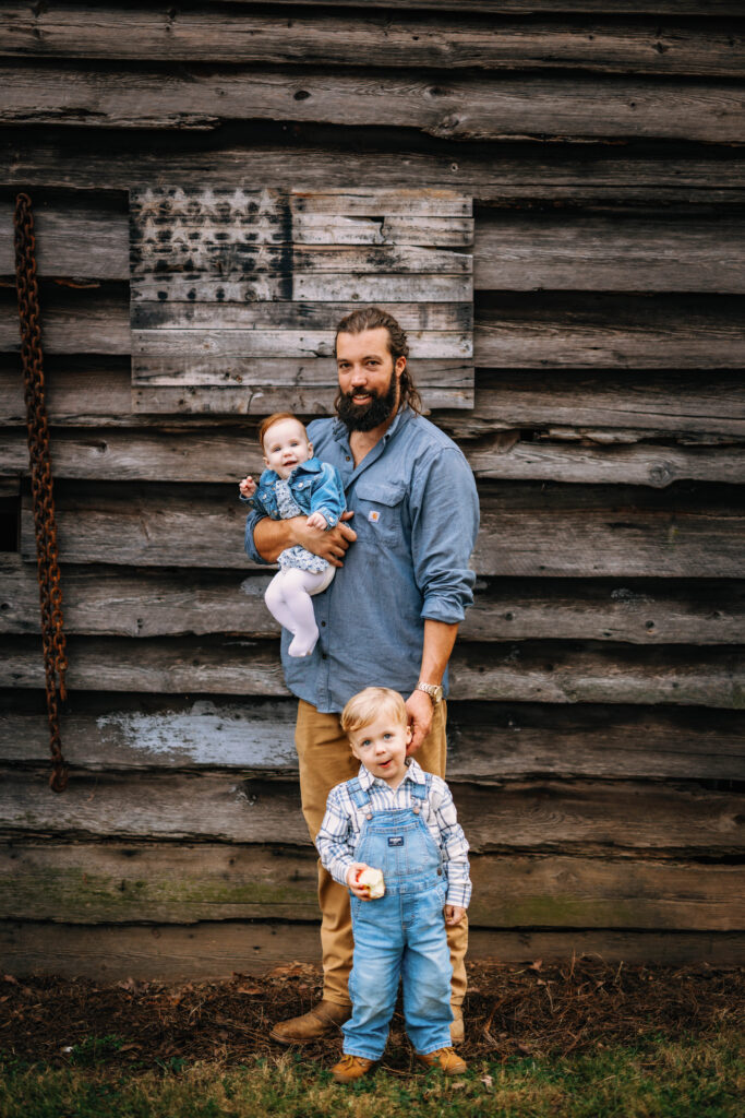 Father with his children at family session in North Carolina on Private property 